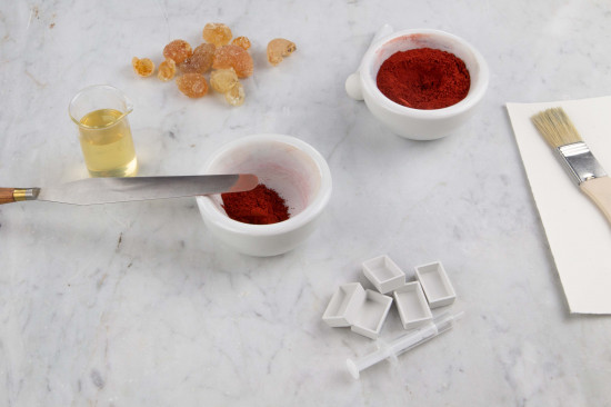 Pieces of Gum Arabic (#63300) can contain natural impurities, so the gum solution should be filtered. Another possibility is to put the pieces into tights and dissolve them in there, which will hold back the impurities while only the gum arabic will go into solution. Stir the gum arabic into cold water, then put it into a bain-marie. Stir occasionally until the gum arabic has completely dissolved. Gum arabic powder (#63330) will dissolve faster, but has to be stirred thoroughly in order to prevent lumps! Gum arabic will also dissolve in cold water but this may take 2-3 days. Gum arabic solutions spoil easily and should be stored in a refrigerator. The solution’s durability can be enhanced by adding preservatives, such as a drop of Clove Oil (#73700), Biodocarb (#78744), or Preventol® (#78740).