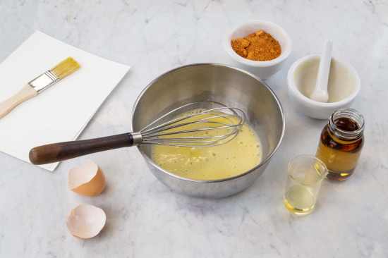 Stir the egg with a mixer or whisk until smooth, then, while constantly stirring add the walnut oil drop by drop.