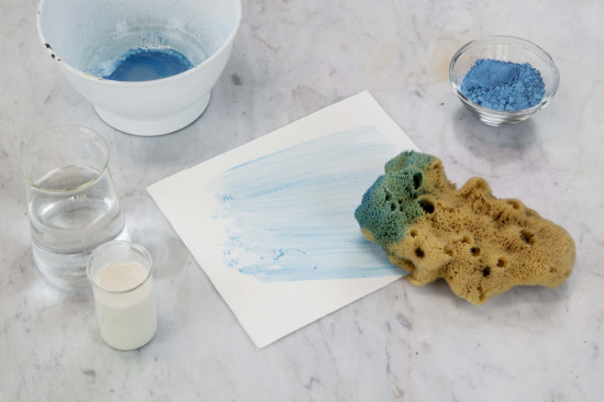 Apply the wash with a scumbling brush or a sponge.