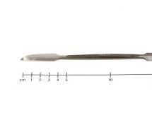 Racloir, denté bilatéral, 18 cm